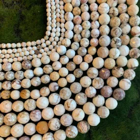 Natural Howlite - Faceted Rounds